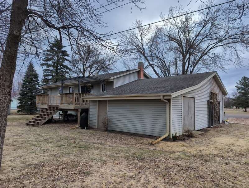 Rear roof and garage before replacement on 114th Court North in Champlin Minnesota