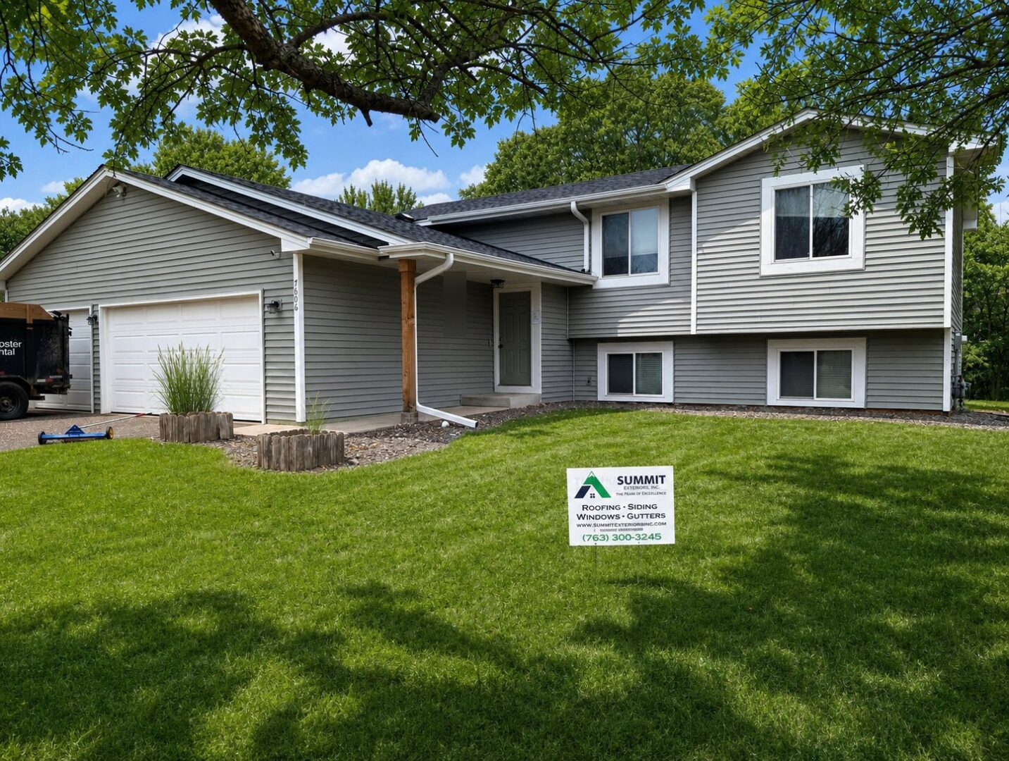 Completed GAF HDZ roof and Alside Charter Oak vinyl siding installation on 116th Avenue North in Champlin Minnesota