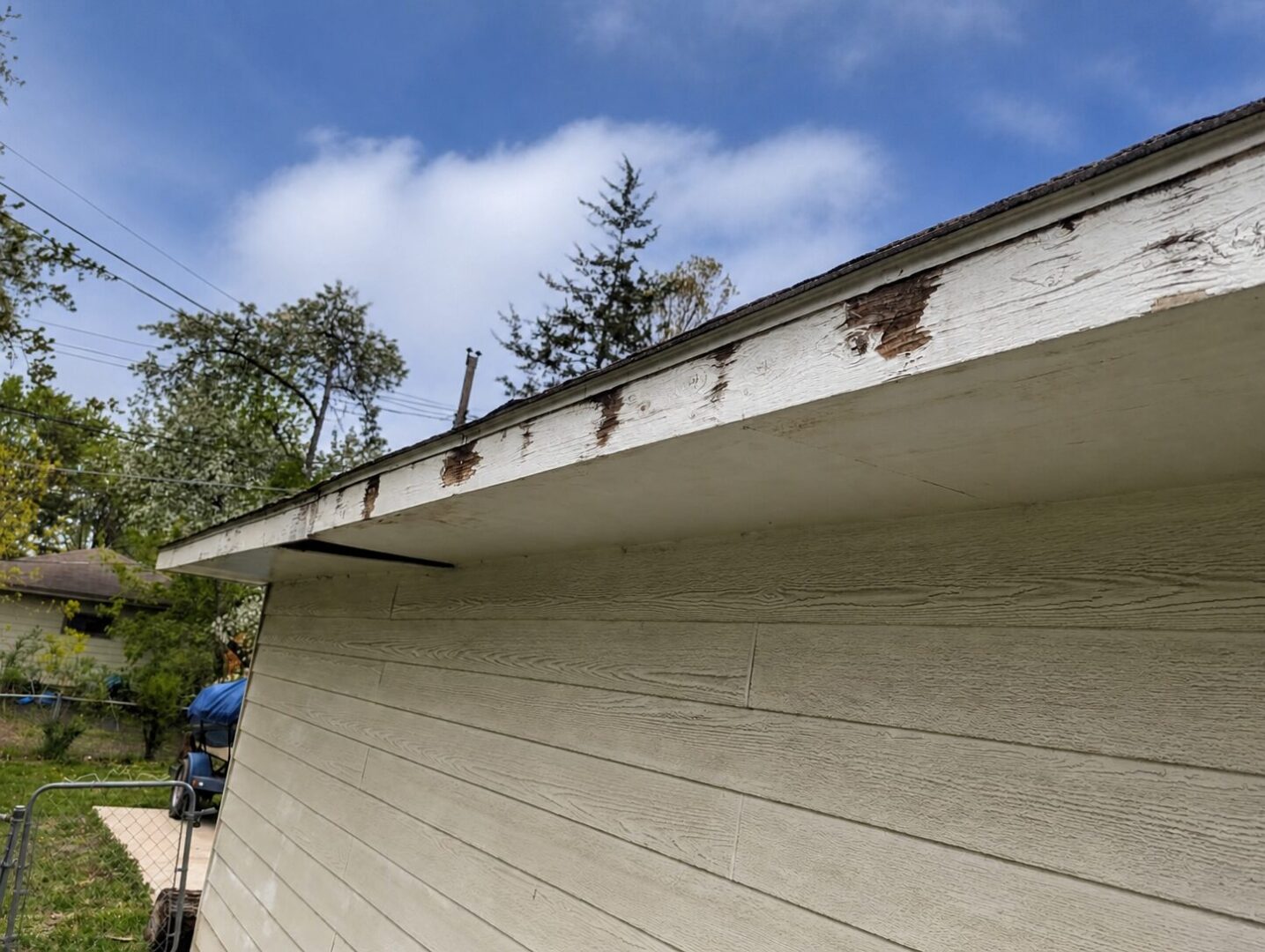 Damaged fascia and peeling paint before exterior repair on 45½ Avenue N in New Hope, Minnesota