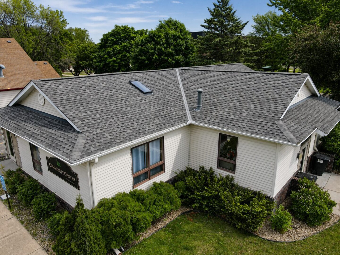 Aerial view of completed GAF Timberline HDZ roof replacement on Gettysburg Avenue North in Champlin, Minnesota