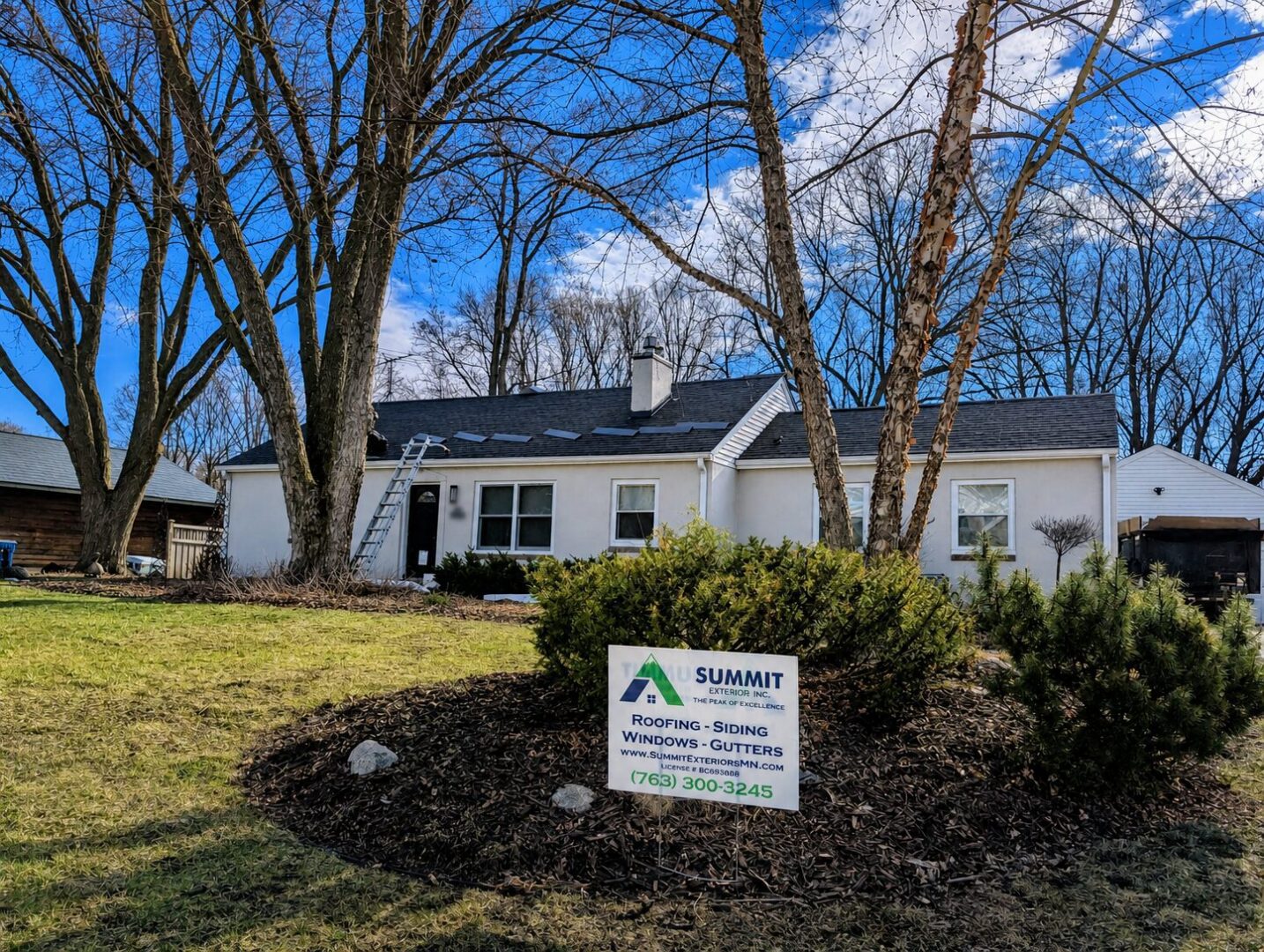 Privacy-safe front view of a completed GAF Timberline HDZ roof replacement on Leroy Street in Wayzata, Minnesota