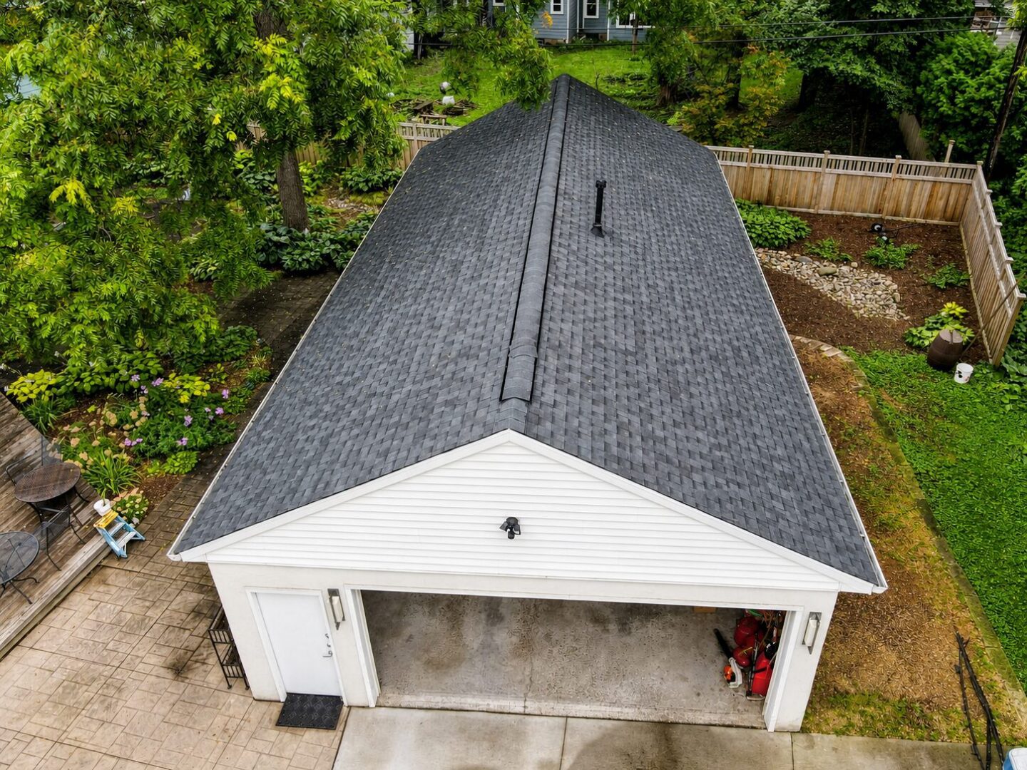 Completed GAF Timberline HDZ shingles on a garage roof on Leroy Street in Wayzata, Minnesota