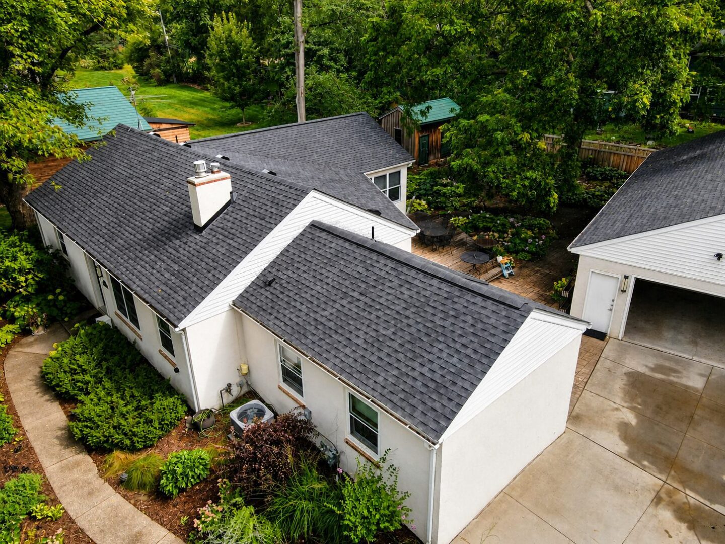 Aerial overview of a completed GAF Timberline HDZ roof replacement on Leroy Street in Wayzata, Minnesota