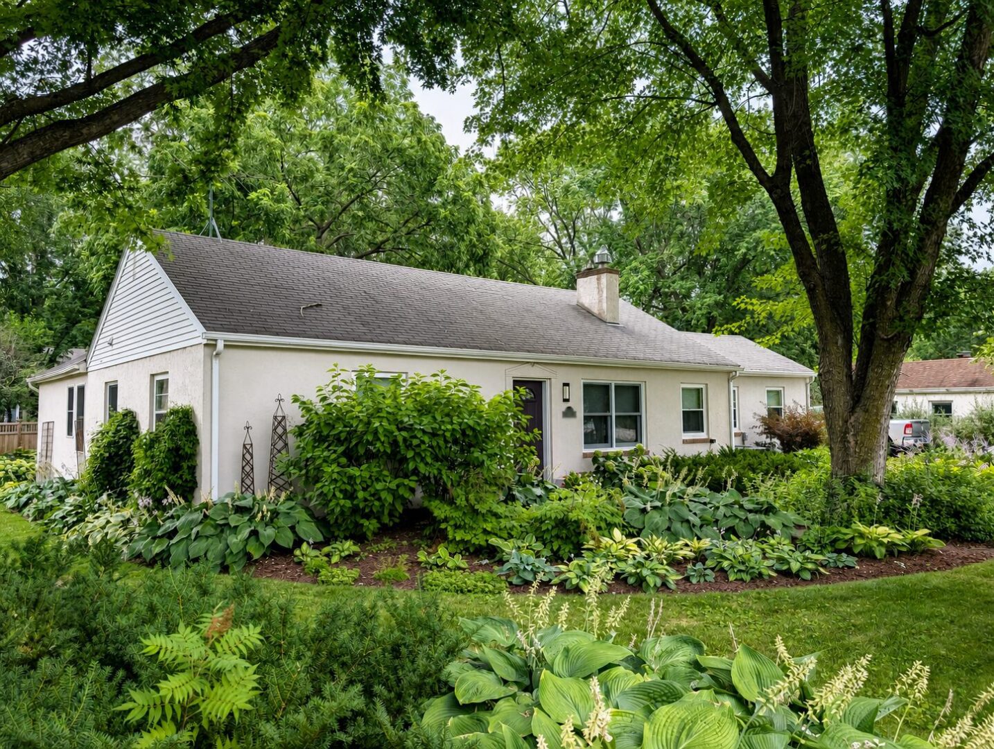 Privacy-safe front view of a Wayzata home before GAF Timberline HDZ roof replacement on Leroy Street