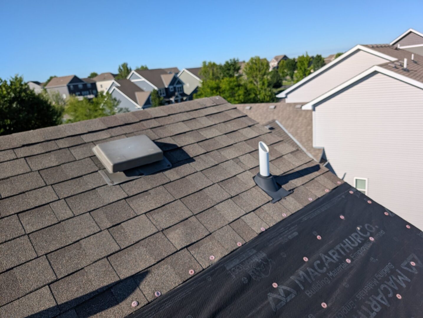 Before roof replacement showing the existing roof and vent on 68th Circle NE in Otsego, Minnesota